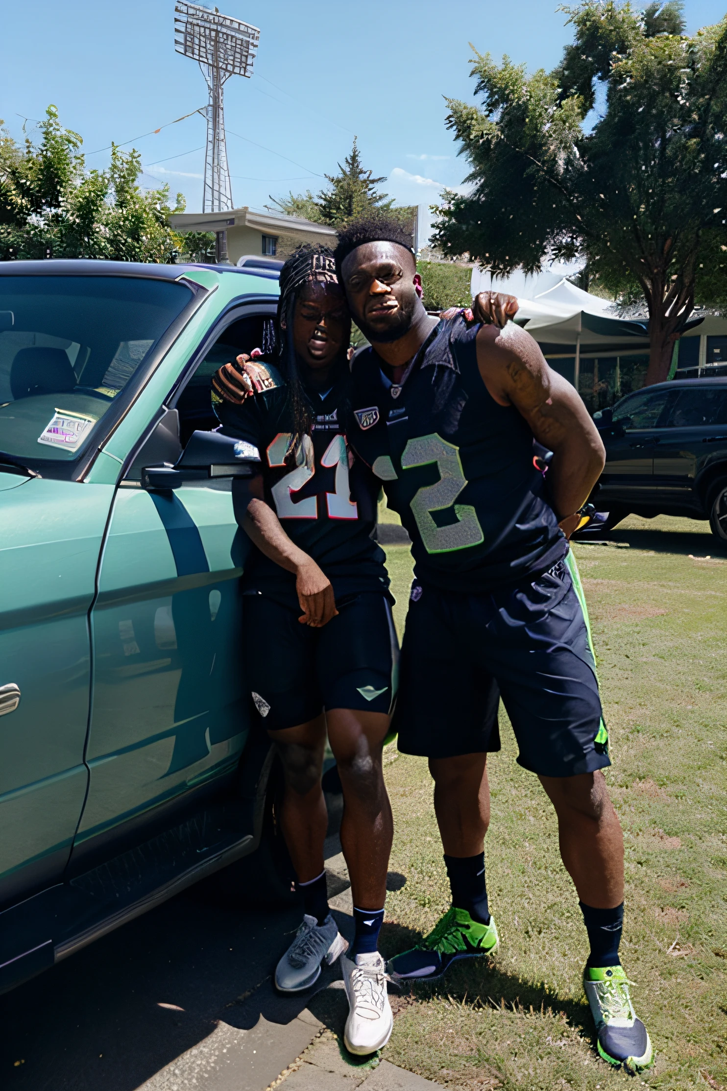Marshawn lynch in a seattle seahawks jersey trucking a tiger