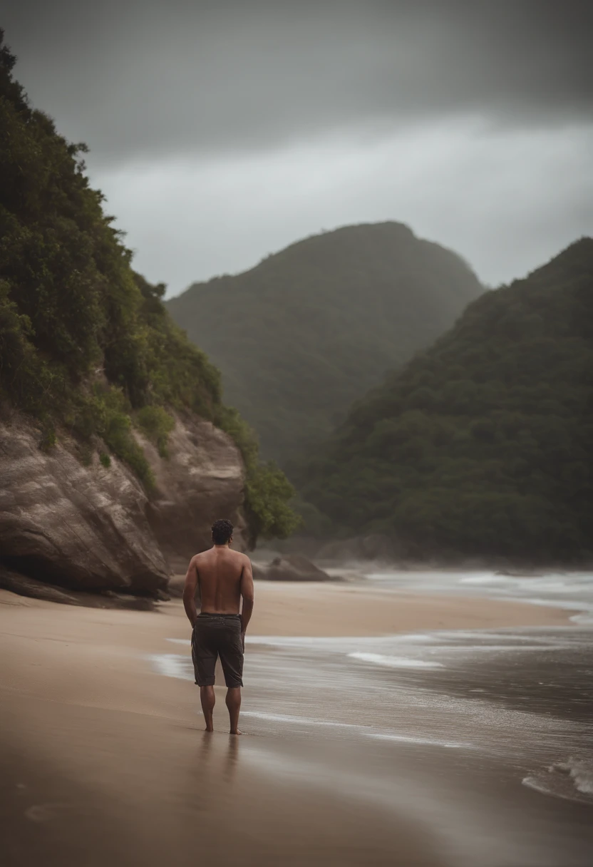 Homem sentado na praia