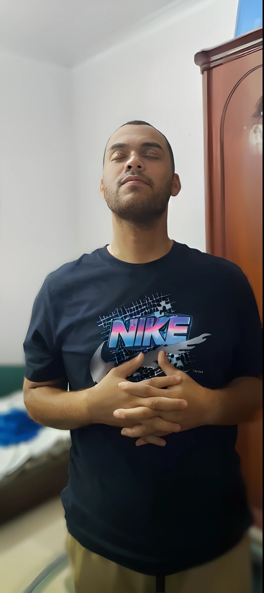 there is a man standing in a room with a black shirt, profile picture 1024px, frontal picture, very low quality picture, in the style of sifu 🔥 😎 🕹️ 👀 :2, frontal pose, mike