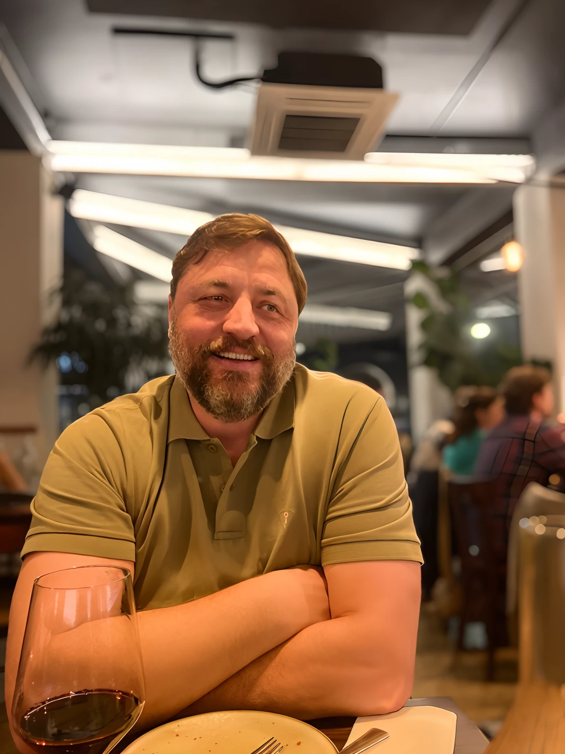 there is a man sitting at a table with a plate of food and a glass of wine, egor letov, andrei riabovitchevy, man in his 40s, konstantin porubov, alexey gurylev, stocky, ivan aivakovsky, andrei ryabovichev