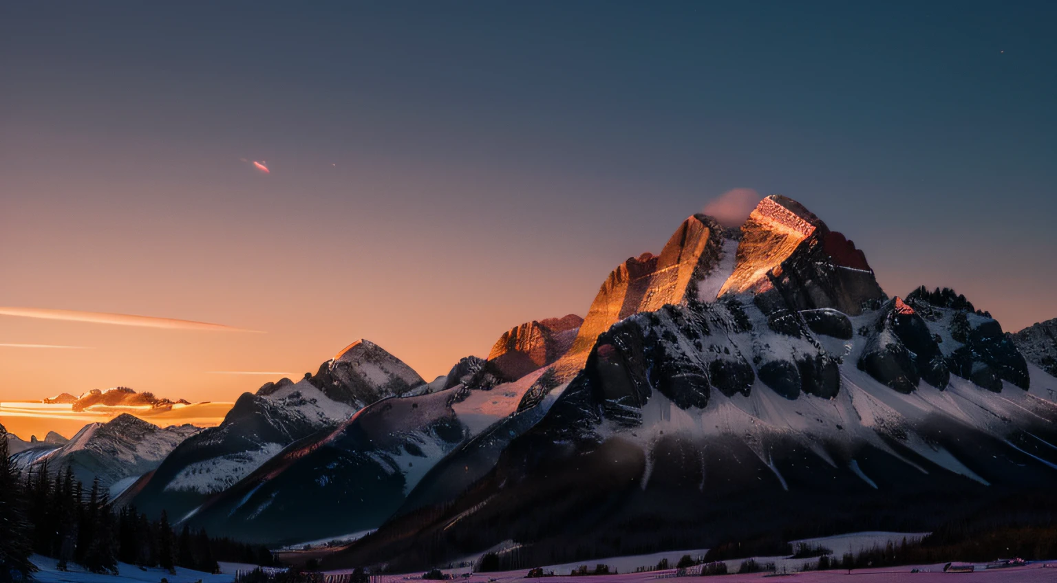 The mountain range stands resolute, its silhouette dark against the pre-dawn sky. The first rays of light paint the peaks in hues of orange and pink, creating a serene and awe-inspiring vista.
