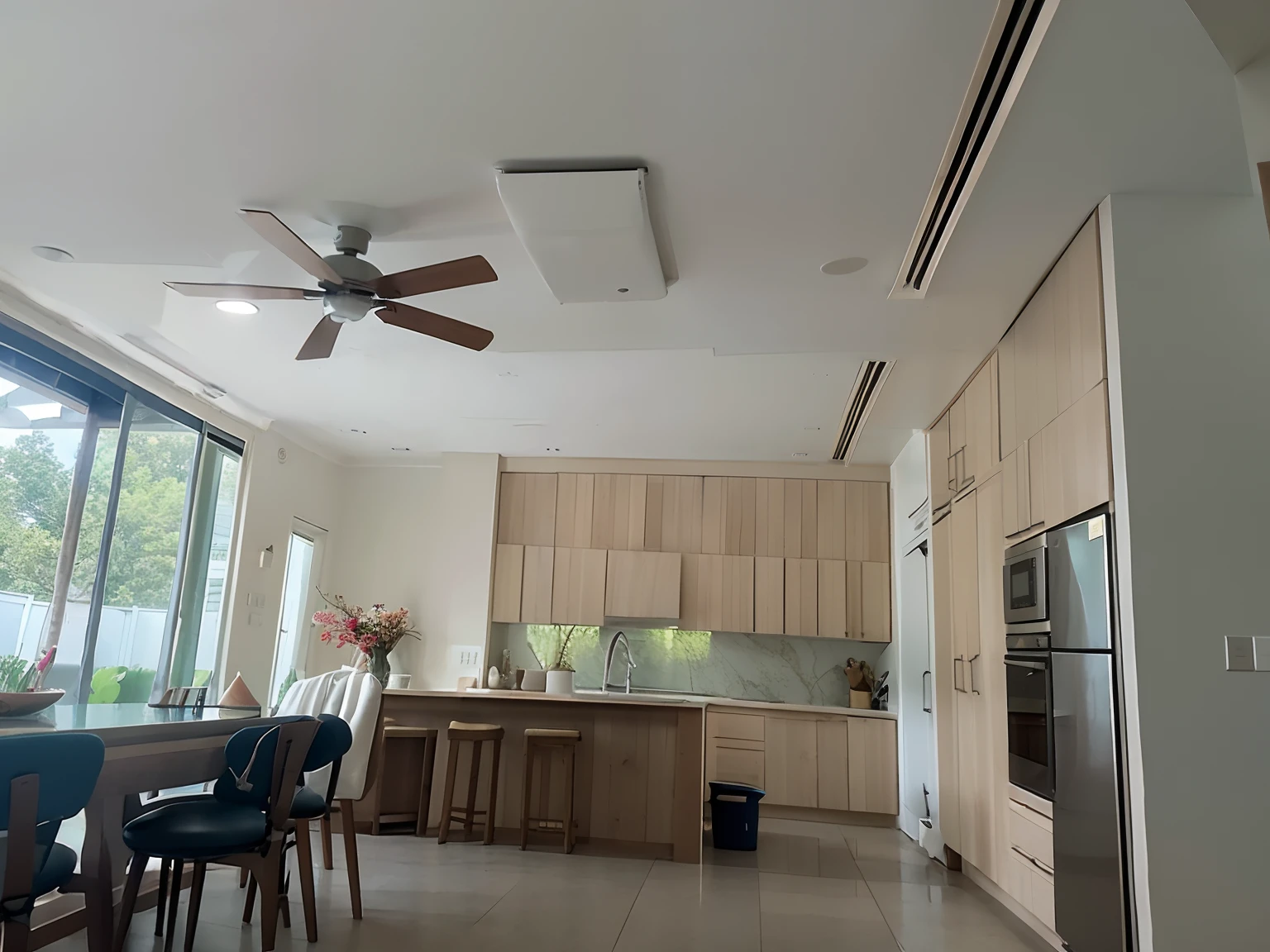 there is a ceiling fan in the middle of a kitchen, low ceiling, tall ceiling, simple ceiling, with backdrop of natural light, one ceiling fan, high ceiling, tall ceilings, white ceiling, very tall ceilings, rounded ceiling, high ceilings, open ceiling, modern minimalist f 2 0, natural light in room, ceilings, house kitchen on a sunny day, wooden ceiling