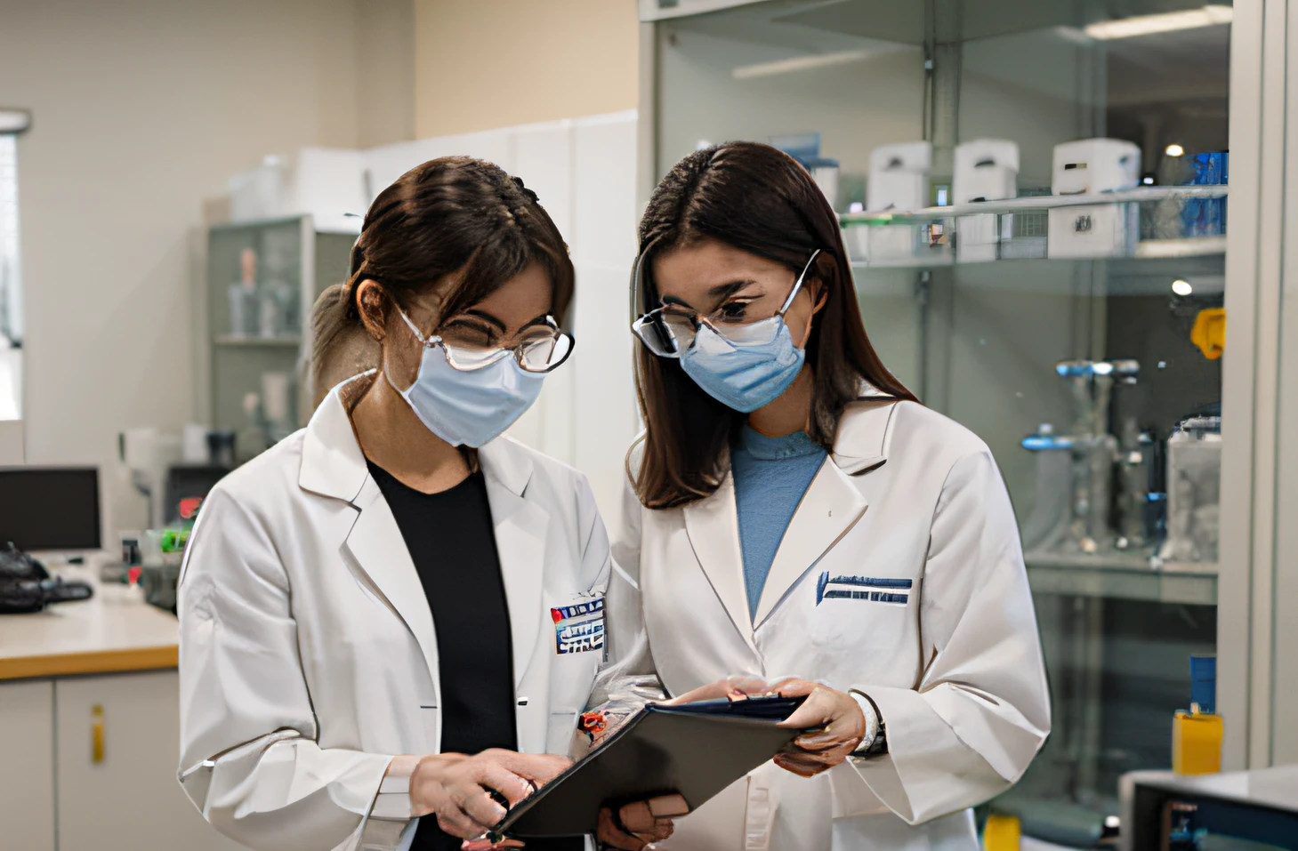 Scientists in white coats doing research in a lab 100 years from now