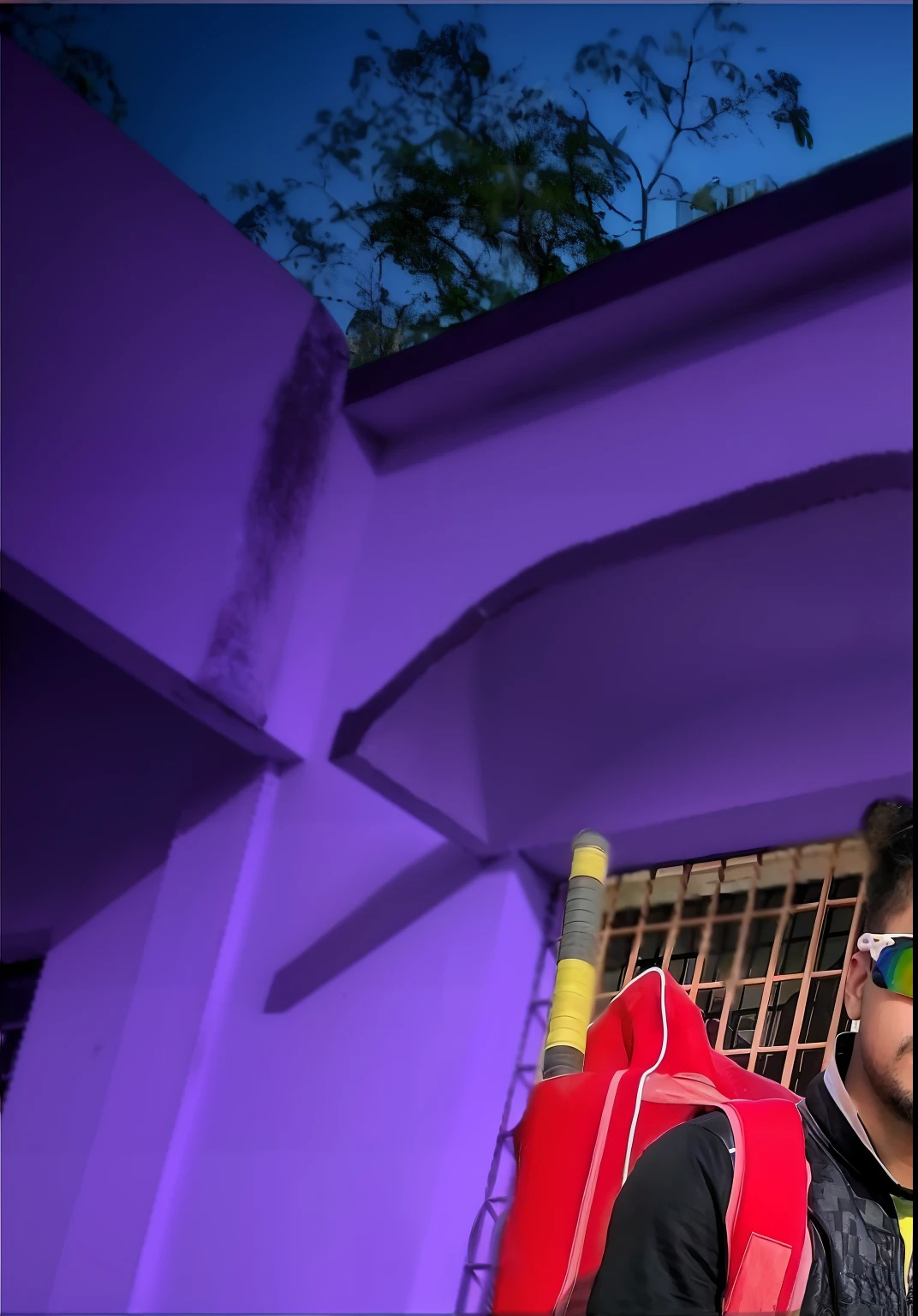 arafed man sitting on a motorcycle in front of a purple building, without helmet, picture of a male biker, motorbiker, shot on nikon z9, biker, taken with sony alpha 9, * colour splash *, with a cool pose, candid picture, stylish pose, front profile!!!!, sitting on cyberpunk motorbike, jayison devadas style, mohamed chahin style realstic