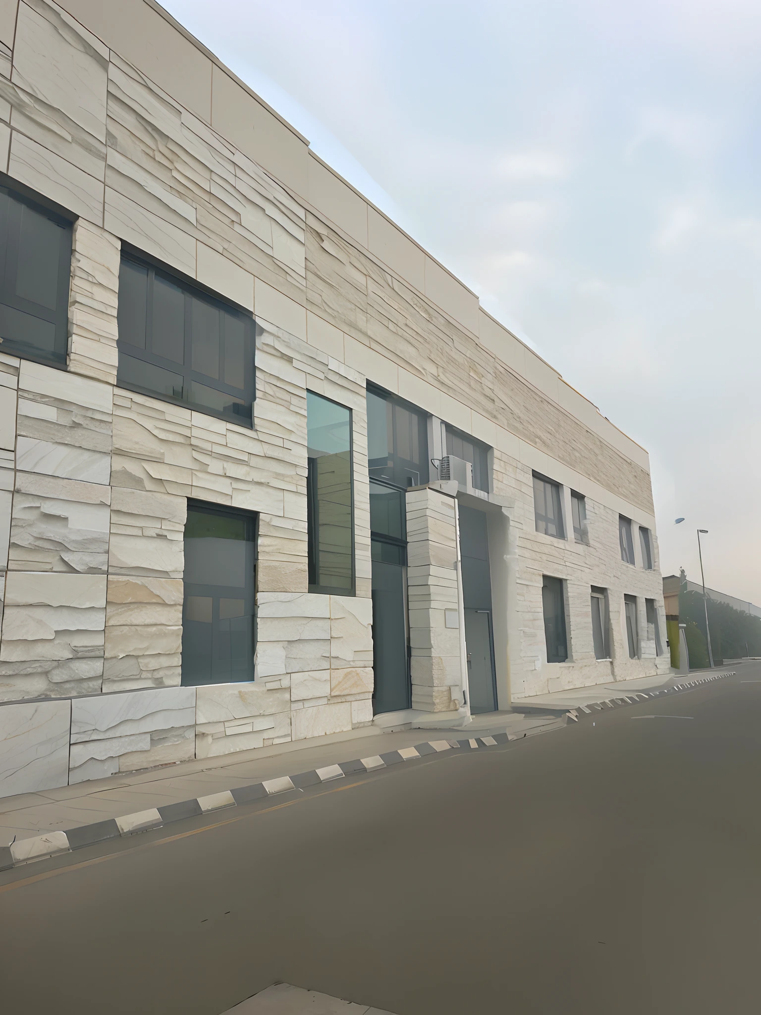 change material to stone cladding