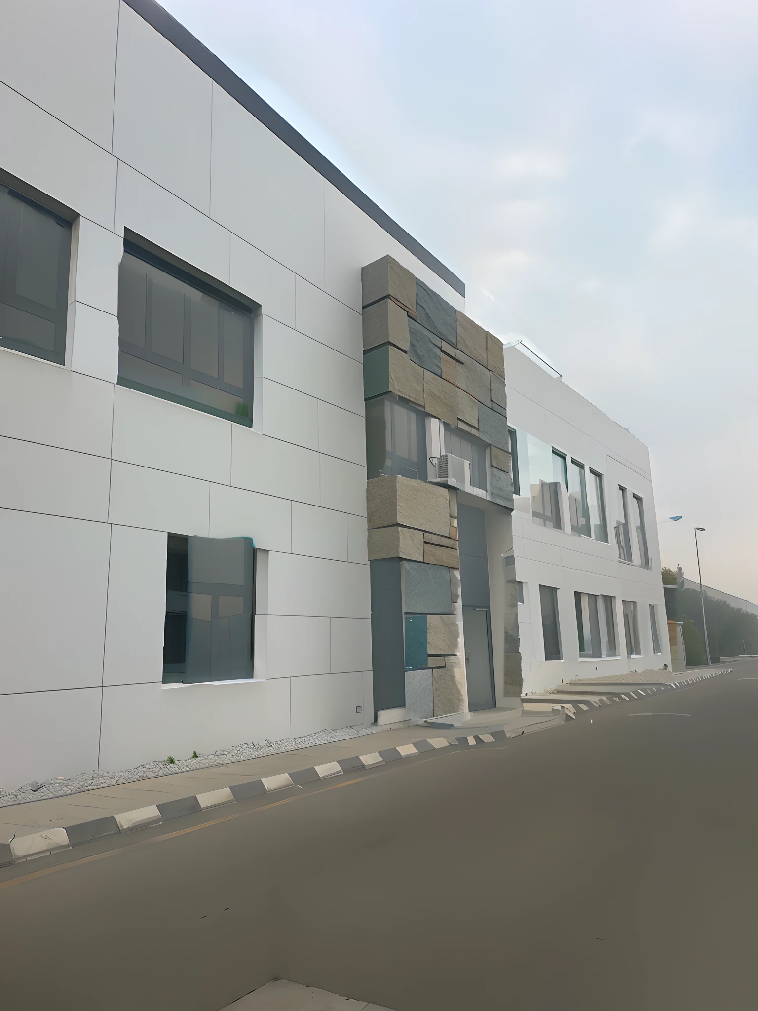 change material to stone cladding