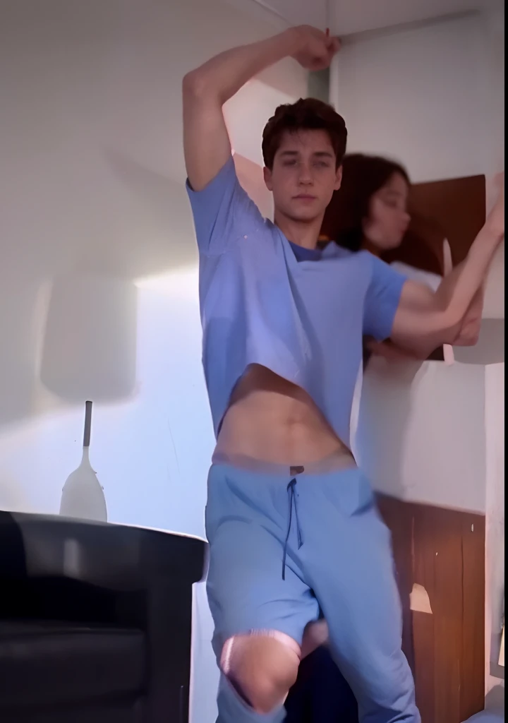 Boy stretches his arms