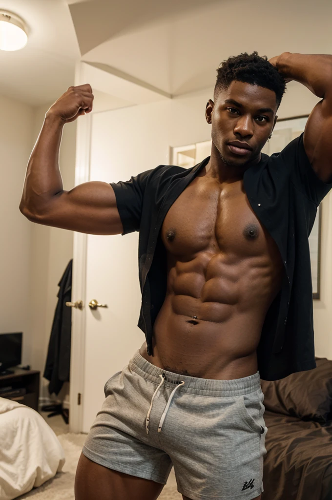 hot lean muscular but big juicy pecs black darkskin male in his early 20s flexing wearing a ripped open shirt and tight shorts in joc k bedroom