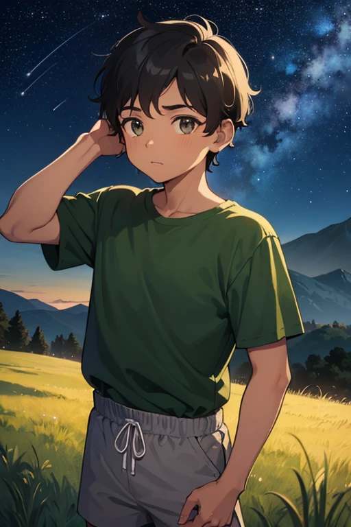 A young brown-skinned boy looks up at the night stars. He has short black hair and wears a green shirt and grey shorts. The background is grass with mountains behind him, with the stars shining, at nighttime. It is nighttime, and the boy is brown-skinned with a plain lime-green shirt with grey shorts.