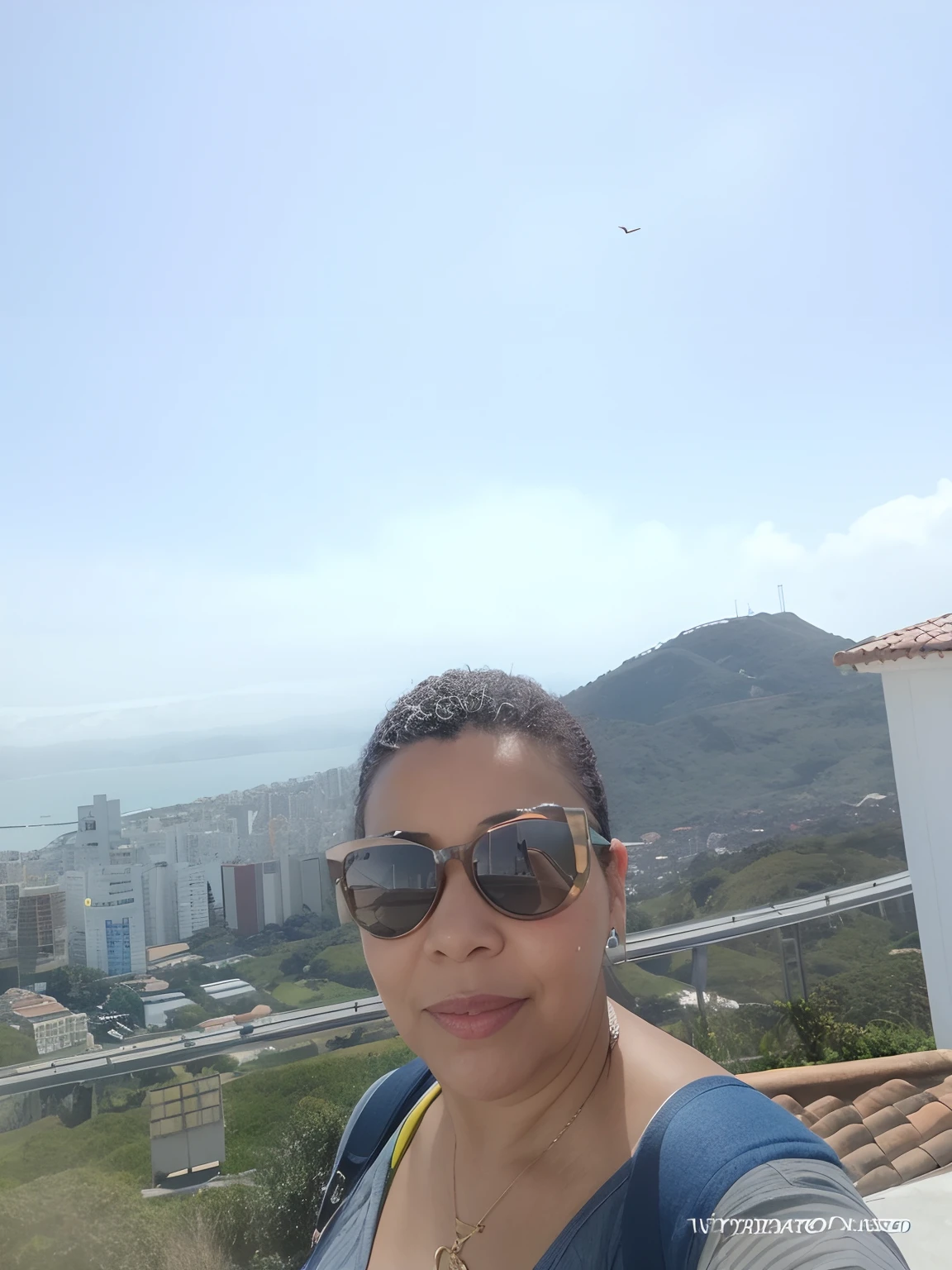 There's a woman standing on a rooftop overlooking the city, com uma cidade em segundo plano, In Sao Paulo, View from the top, com montanhas ao fundo, inspirado em Maria Helena Vieira da Silva, Directed by: Herbert MacNair, lindo dia ensolarado, 3 5 year brazilian mother, com montanhas no fundo, vacation photo, amazing view