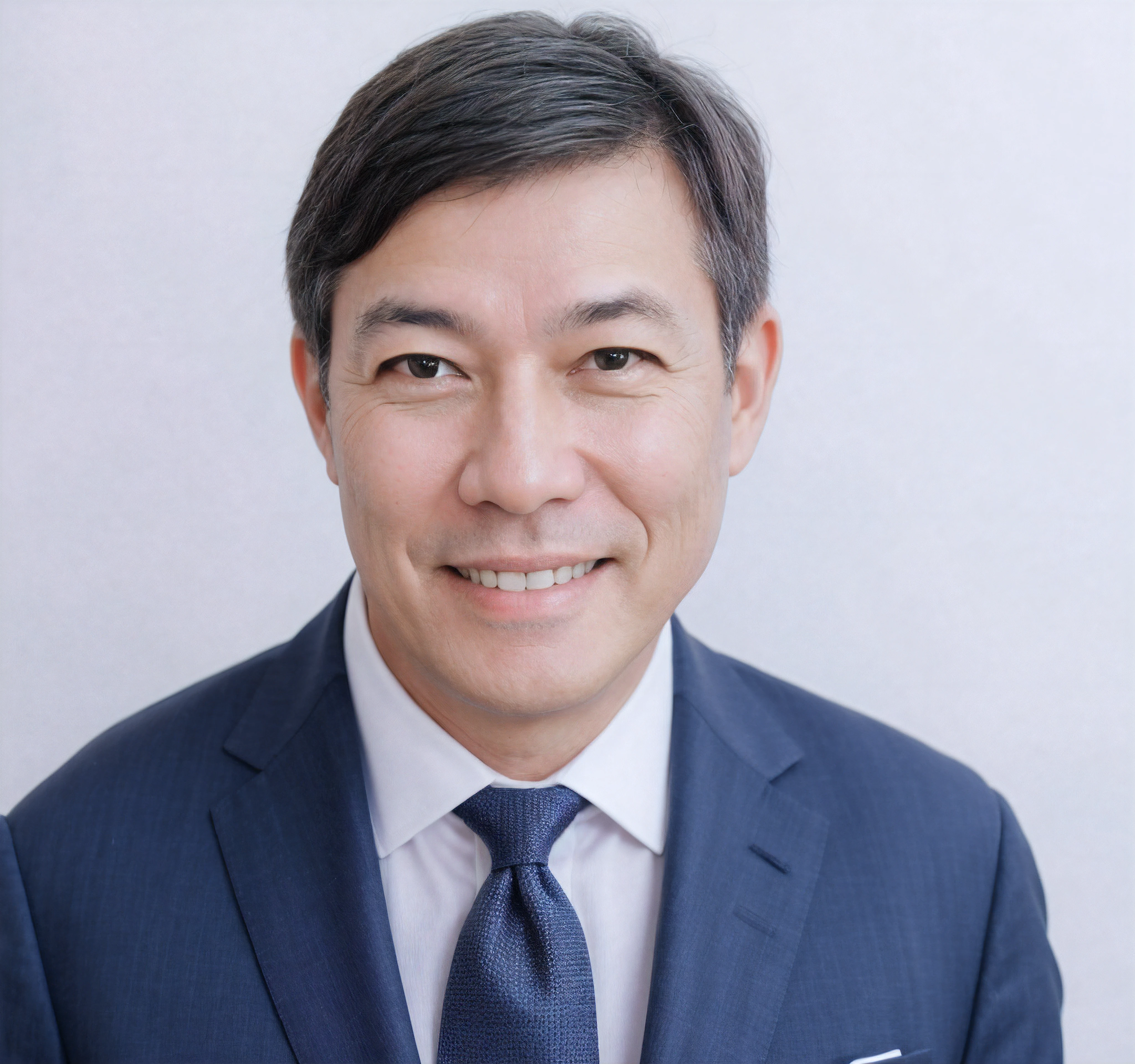 there is a 52 year old man in a suit and tie smiling for a photo, gray hair, detailed face, high quality,