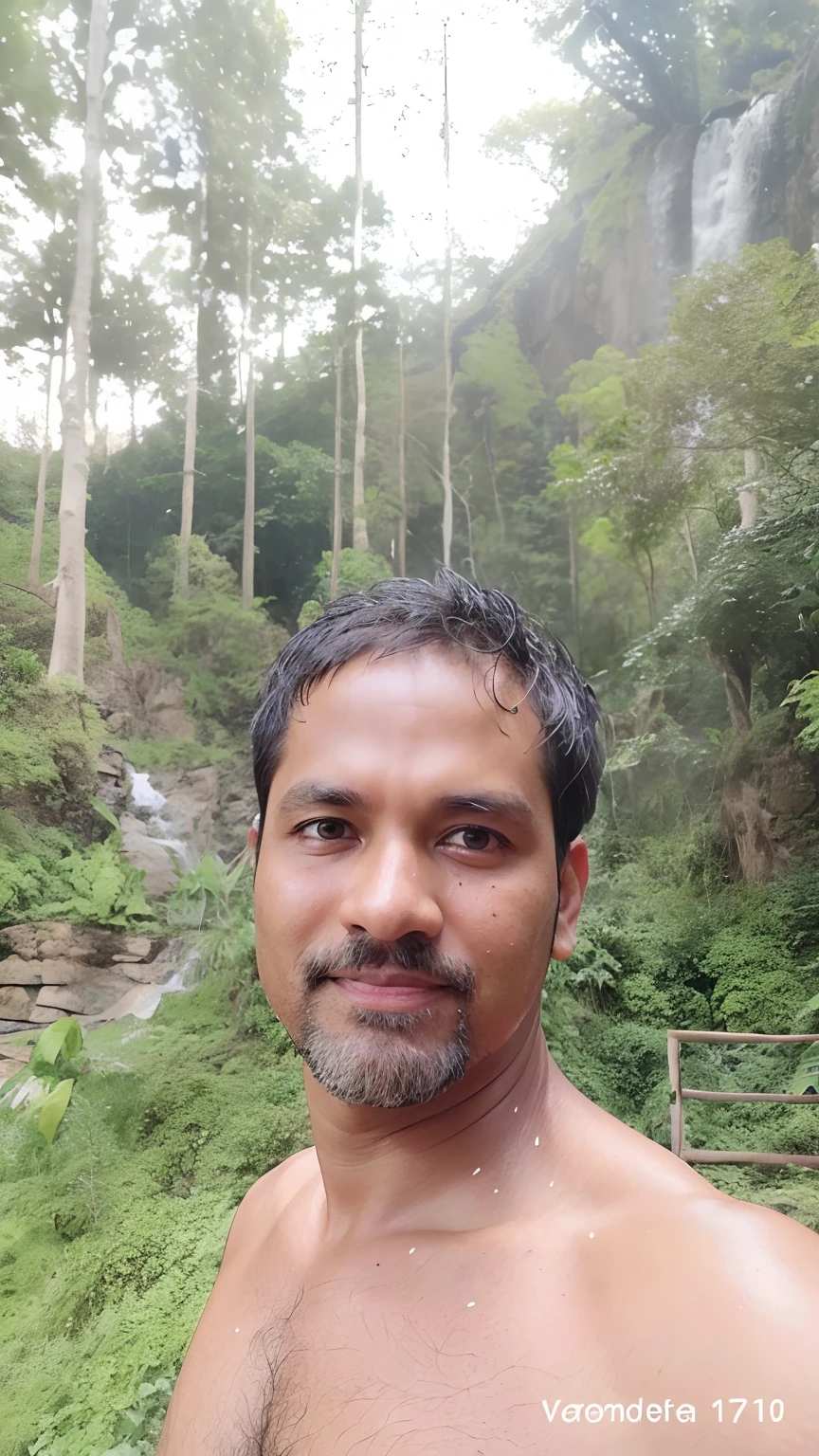 there is a man standing in front of a waterfall in the woods, 4 0 years old man, (38 years old), about 3 5 years old, in front of a forest background, vinayak, 5 0 years old man, jayison devadas, amidst nature, 3 2 years old, 45 years old men, in jungle forest peak