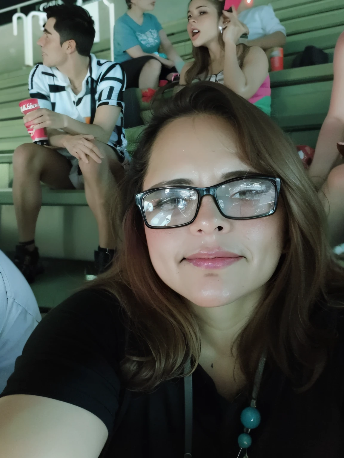 there is a woman with glasses sitting in the stands, 3 0 anos mulher, Alanis Guillen, Lorena Avarez, Mulheres de 40 anos, non blurry, 3 0 anos de idade mulher, Mulher de 30 anos, muito bobo olhando, olhar orgulhoso, Directed by: Randy Vargas, taken in the late 2010s, non blurry