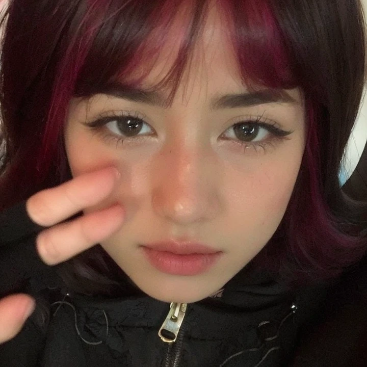 (masterpiece), (portrait), (aesthetic), (beautiful), (upper blody), (high quality), (aesthetic clothings), (professional angle), (rule of thirds), (Feminine), (woman), (female), (beautiful),(feminine features), (24 years), solo, 1 woman, (attractive Japanese), Spring, (Falling Cherry Blossoms), (Evening), (Soft light), ((Blowing a Kiss)), (Resting on a Desk Hands), ((Looking towards the Camera Face)), ((Joyful)), (Light and Fresh Make-up), (Moderate Bust), (Dainty Hairpin), ((Medium Length Hair)), (Dark Brown Hair), (Straight Hair), (Loose Waves hair), (Floral Hair Clip in Hair), (Half Open Eyes), (Emerald Green Eyes), (Cute Look), Fair skin, (Subtle Embroidery Clothing), (Flowy Blouse), (-), (A-line Skirt ), Sweetheart, ((Classroom background)), (Close-Up Shot)