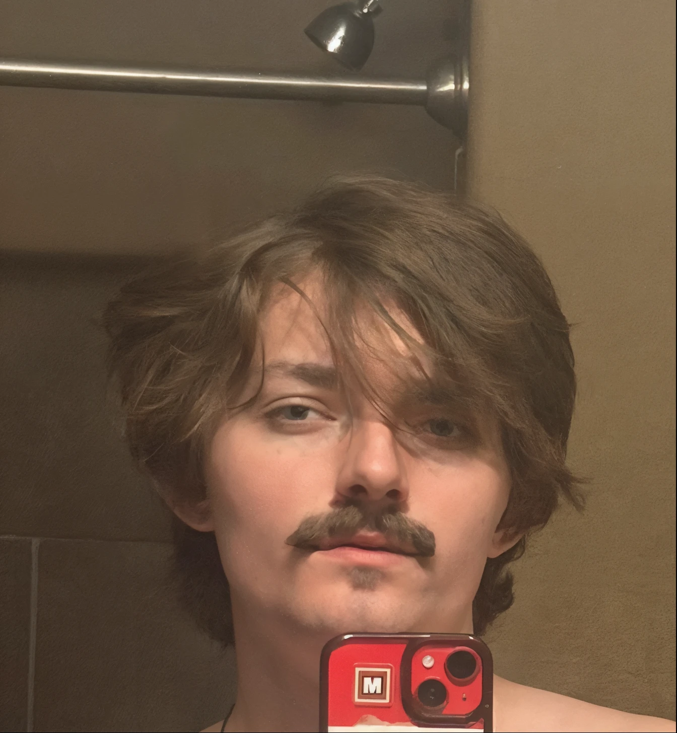 Give him a mustache and a soul patch