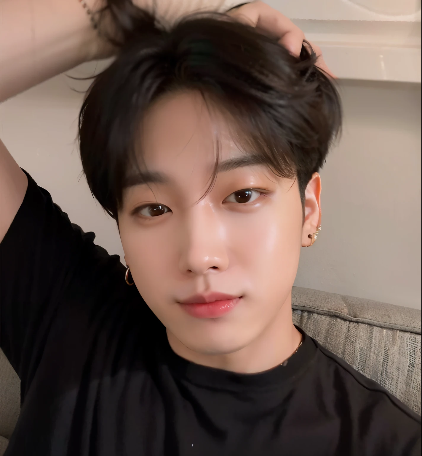 There's a man in a black shirt sitting on a couch, Jungkook, wan adorable korean face, TaeJune Kim, Cai Xukun, Hyung Tae, Kim Doyoung, 1 7 - ano - menino rosto magro, foto de perfil headshot, com cabelos curtos, com o mesmo penteado, Sul Coreano Masculino, taken in the early 2020s, Hong June Hyung