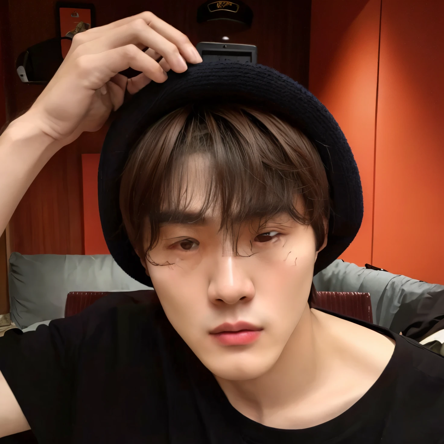 There is a man who is wearing a hat and posing for a photo, Yoongi de cabelos pretos, TaeJune Kim, Jimin\'s right eyelid swollen, Jungkook, Hyung Tae, Cai Xukun, Jung Jaehyun, Wonbin Lee, Steven Jung, he also wears a grey beanie, Jaeyeon Nam, Hong June Hyung, taken in the early 2020s