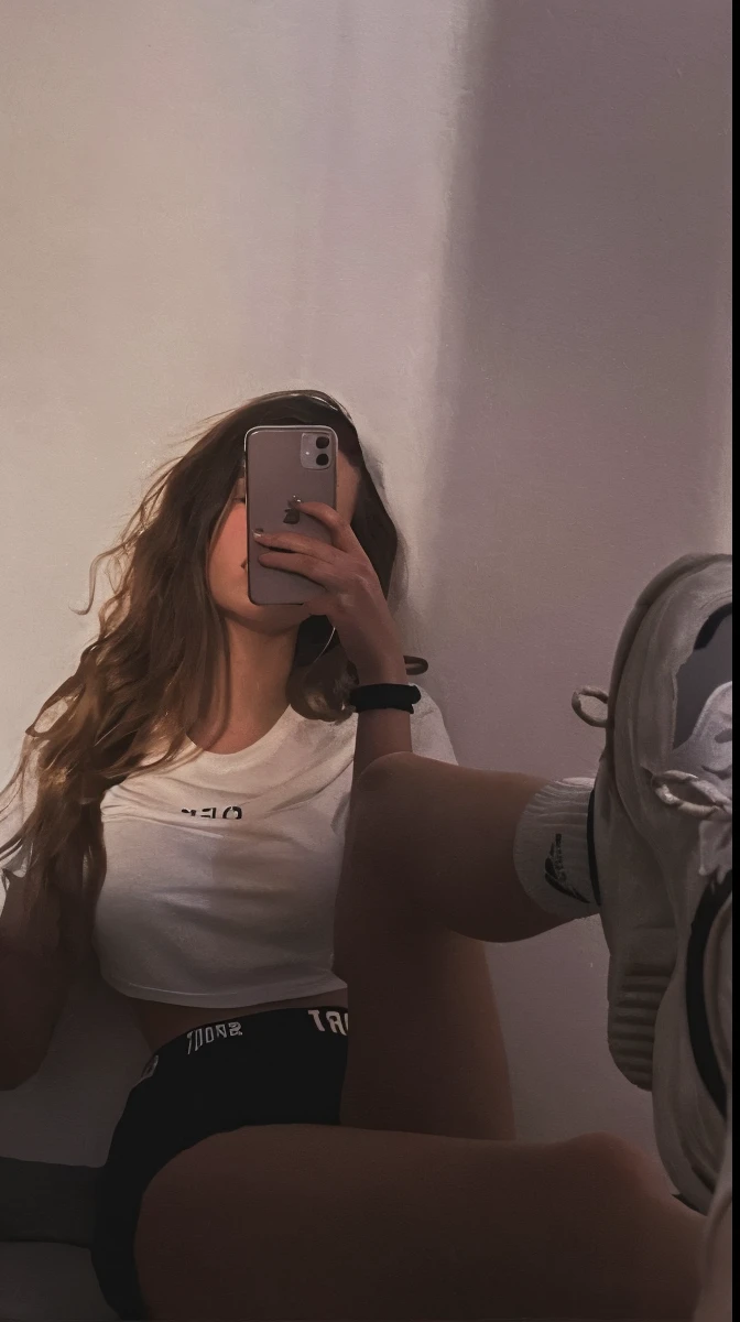 there is a woman taking a selfie in a mirror, low quality photograph, mirror selfie, low quality photo, sneaker photo, outfit photo, distorted photo, fit pic, very very low quality picture, profile image, dressed in a white t shirt, 😭 🤮 💕 🎀, inspired by Elsa Bleda, aesthetic!!, by Christen Dalsgaard