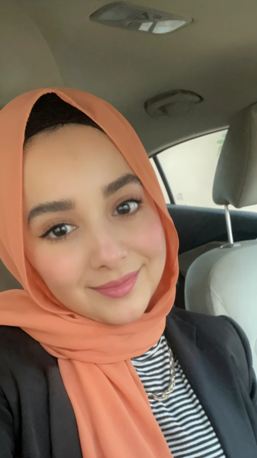 woman in a car wearing a scarf and a black jacket, inspired by Maryam Hashemi, profile picture, profile image, headshot profile picture, sitting in her car, inspired by Fathi Hassan, faridah malik, taken on iphone 14 pro, taken on iphone 1 3 pro, wearing a fisher 🧥, casually dressed, hijab, selfie of a young woman