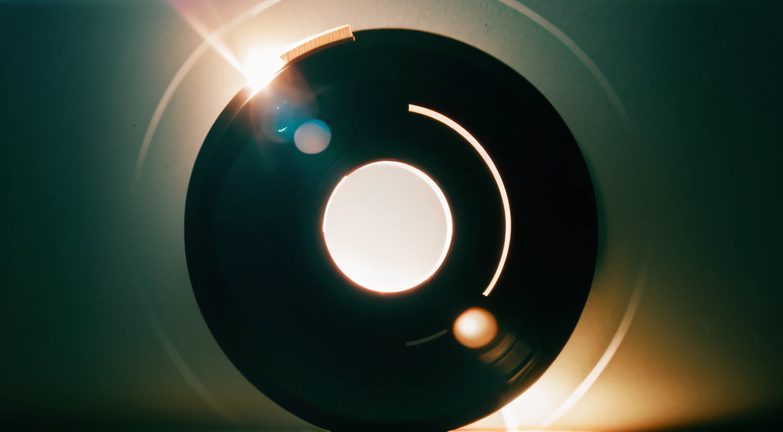 Analog photography with circular element. The center of the circle must be in the center of the image.