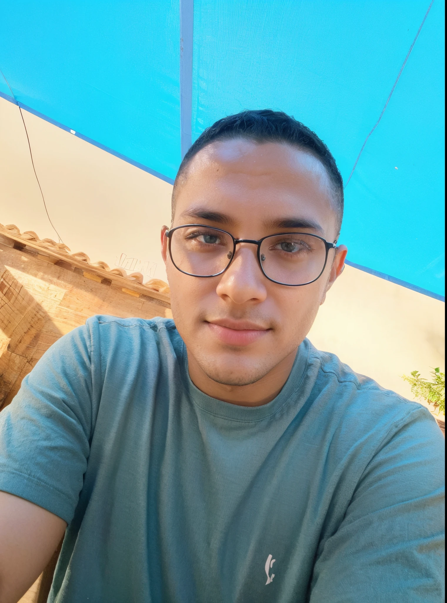 (1st grade) jovem negro, cabelo preto raspado, parecendo taylor Launer, barba perto do rosto bem feita, olhos vermelhos castanhos claros. Youtuber sitting in front of the camera looking shooting videos for his YouTube channel, quarto arrumado, com postes de terror nas paredes, hands with super details 5 fingers on each hand. On your table a hot coffee
