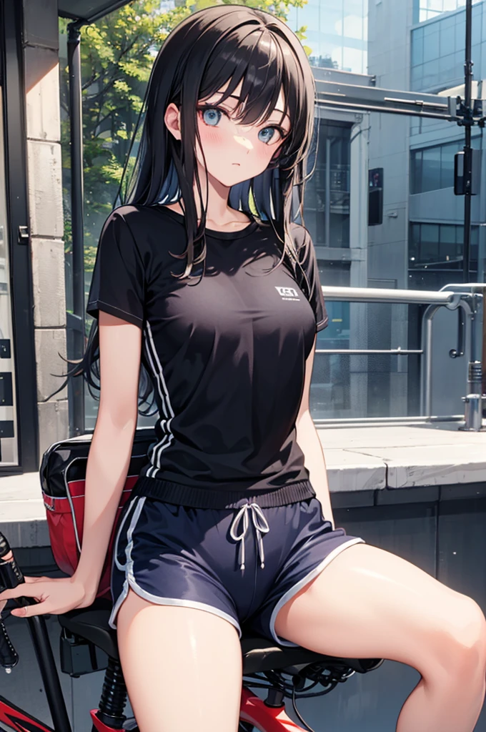 a girl sitting on bicycle saddle, dolphin shorts,