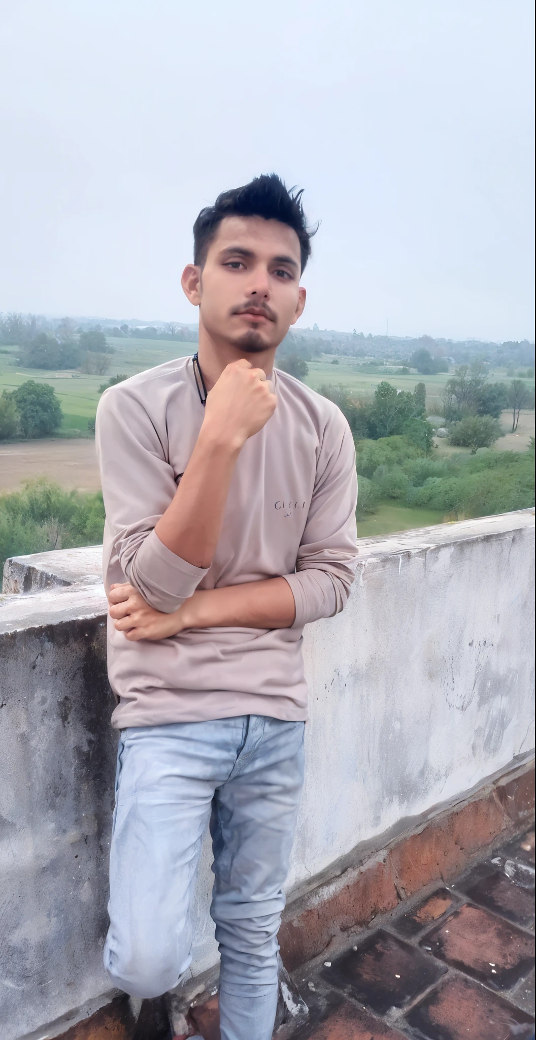 a man standing on a brick wall with his hand on his chin, very very low quality picture, with lovely look, without helmet, candid picture, very clear picture, full body picture, around 1 9 , inspired by Sarper Baran, with a cool pose, with accurate face, inspired by Saurabh Jethani, old picture, vastayan, on rooftop