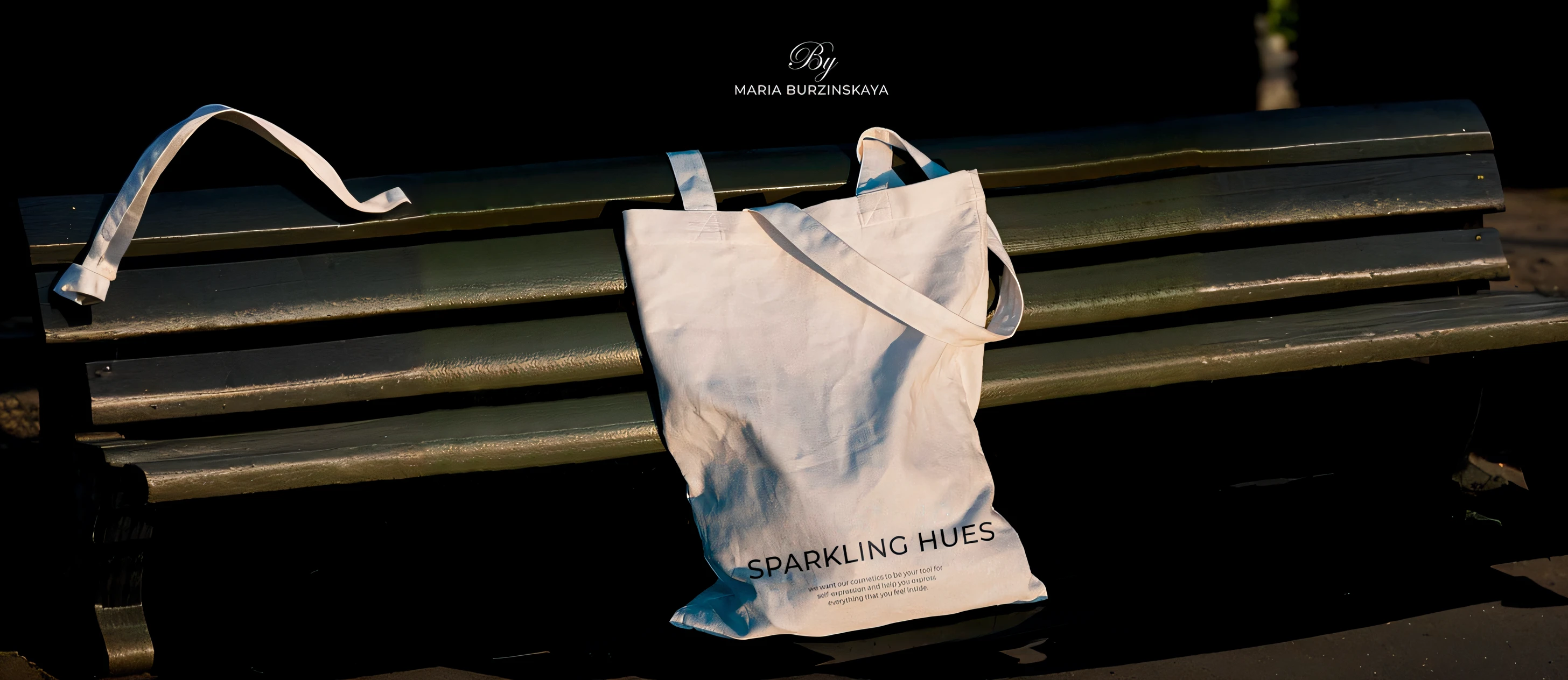 A bag sits on a bench on a black background, sparkle eyes, eyes with brightness, Sparkling, glittery, spark of light, White light shines everywhere, author：Magdalene Barrons, Sparkling crystals, glittery, gleaming in the sunlight, sparkling in the air, Sparkling all around, Sunny morning, Sparkling sky, author：Daniel Jungren, White sparkling sunlight beam
