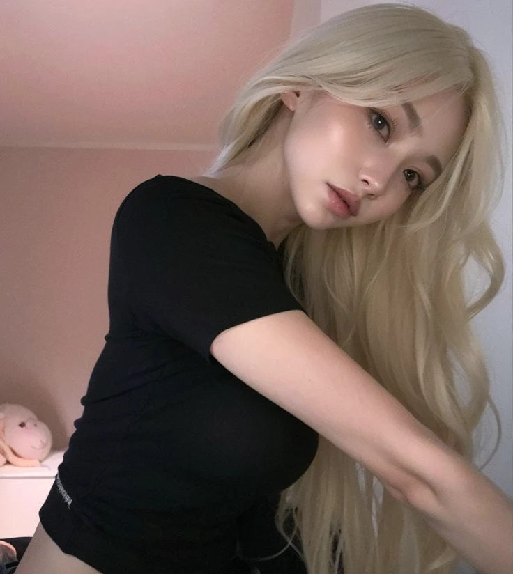 blond woman with long hair posing in a black top and jeans, ava max, with long blond hair, with long white hair, with white long hair, korean girl, roseanne park of blackpink, her hair is white, ulzzang, extremely pale blond hair, very very pale blond hair, with long hair, beautiful south korean woman, long white hair and bangs