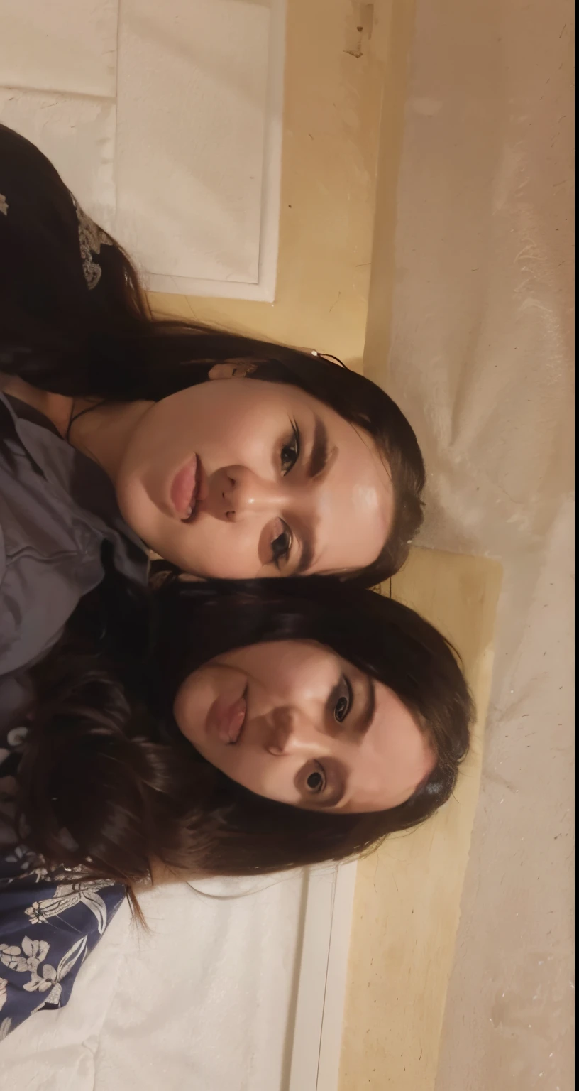 A girl and her sister taking selfie