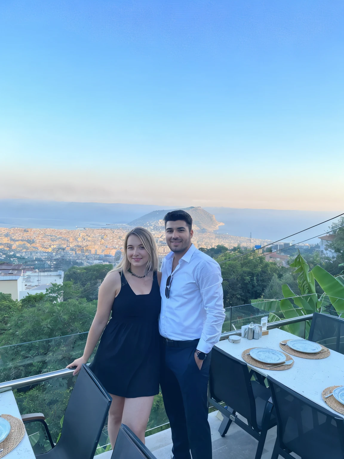 a woman and a man standing on a balcony with a view of a city, paradise in the background, with a city in the background, with mountains in the background, city in the background, nice view, amazing view, great view, with a volcano in the background, with mountains in background, mountains in the background, city in background