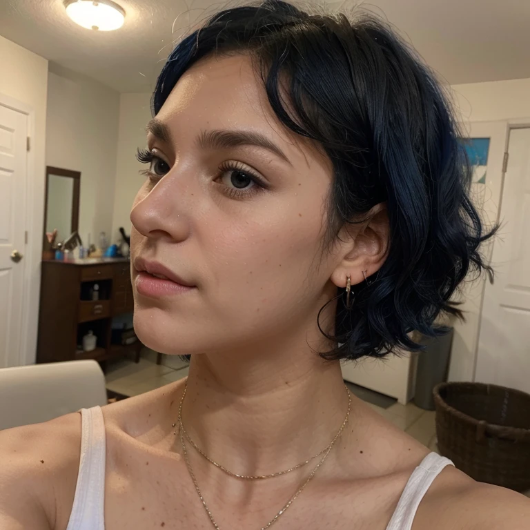 girl with short neck length blue curly hair and nose ring selfie