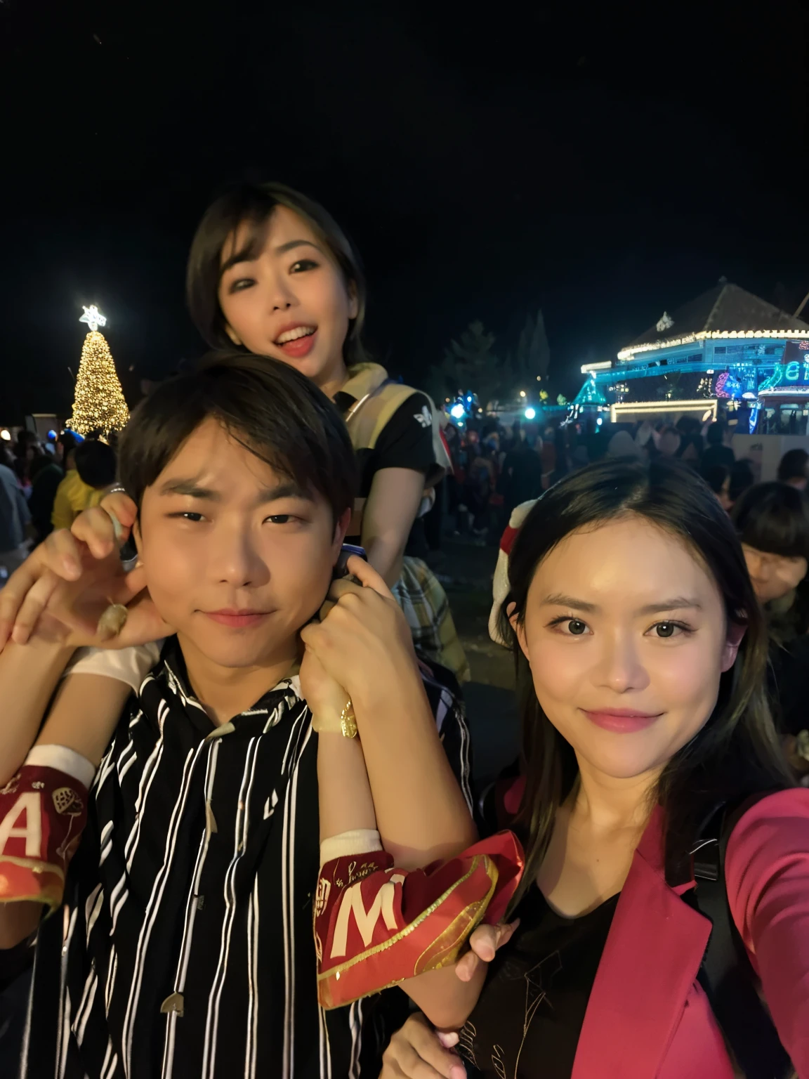 there are two people that are standing together at night, happy family, not blurry, taken with the best dlsr camera, low quality photo, christmas night, with glowing lights at night, family photo, non blurry, very very low quality picture, selfie photo, lights on, vacation photo, blurry image, taken with sony alpha 9, husband wife and son, blurry photo