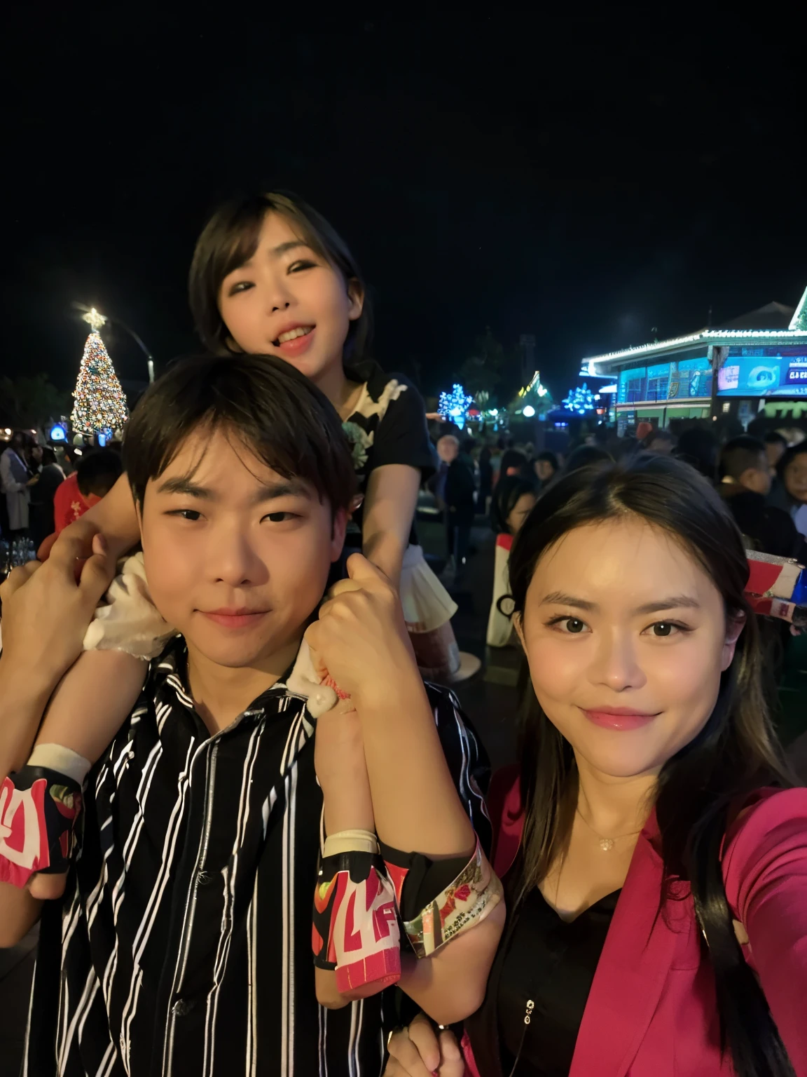 there are two people that are standing together at night, happy family, not blurry, taken with the best dlsr camera, low quality photo, christmas night, with glowing lights at night, family photo, non blurry, very very low quality picture, selfie photo, lights on, vacation photo, blurry image, taken with sony alpha 9, husband wife and son, blurry photo