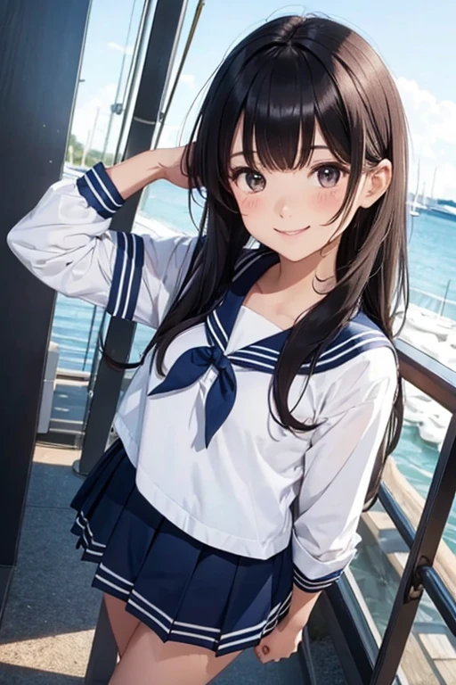 Smiling dark-haired girl in a sailor suit.