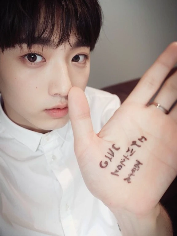 There's a man with a tattoo on his hand that says give me a hand, Jungkook, por Kanbun Master, lovely korean face, Ulzzang macho, 🚀🚀🚀