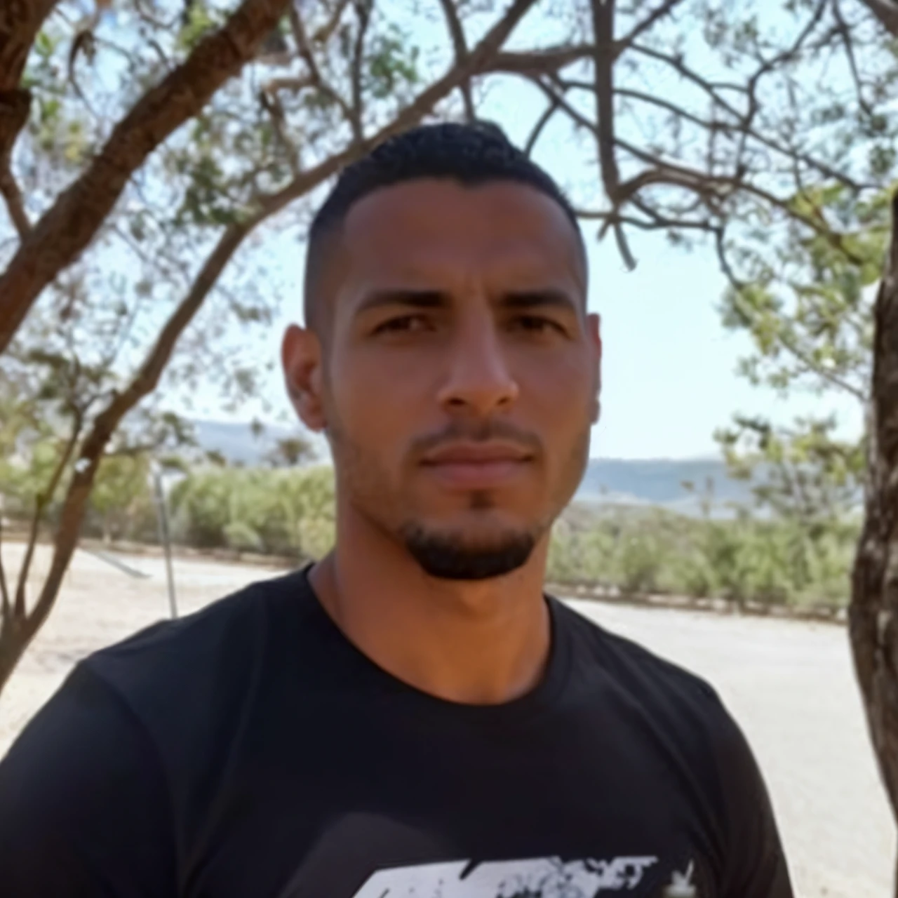 arafed man standing in front of a tree with a black shirt, profile photo, mohamed chahin, taken in the early 2020s, atef, mohamed reda, ronaldo nazario fenomeno, profile pic, profile picture, george pemba, ronaldo nazario, joseph moncada, icaro carvalho, avatar image