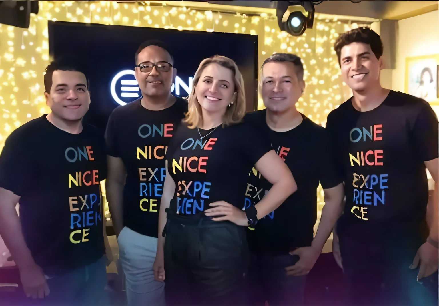 several people in black shirts together in front of a stage, em um fundo escuro, Uma vez, foto de grupo, imagem promocional, In Sao Paulo, foto do perfil, essence, Lgbtq, foto de perfil, extremamente granulado, non blurry, foto promocional, no fundo preto, brilhante no preto, miniatura, Directed by: Ric Estrada, foto de perfil, tirado no iphone 1 3 pro