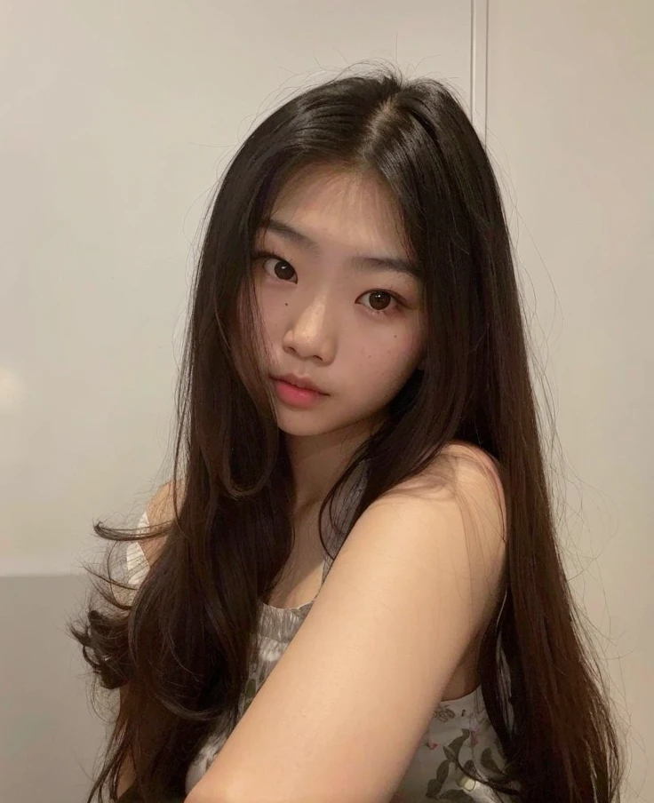 arafed asian woman with long hair posing for a picture, asian girl with long hair, korean girl, beautiful asian girl, asian features, asian girl, young asian girl, with long hair, young cute wan asian face, 18 years old, south east asian with round face, a young asian woman, ulzzang, xision wu, asian face