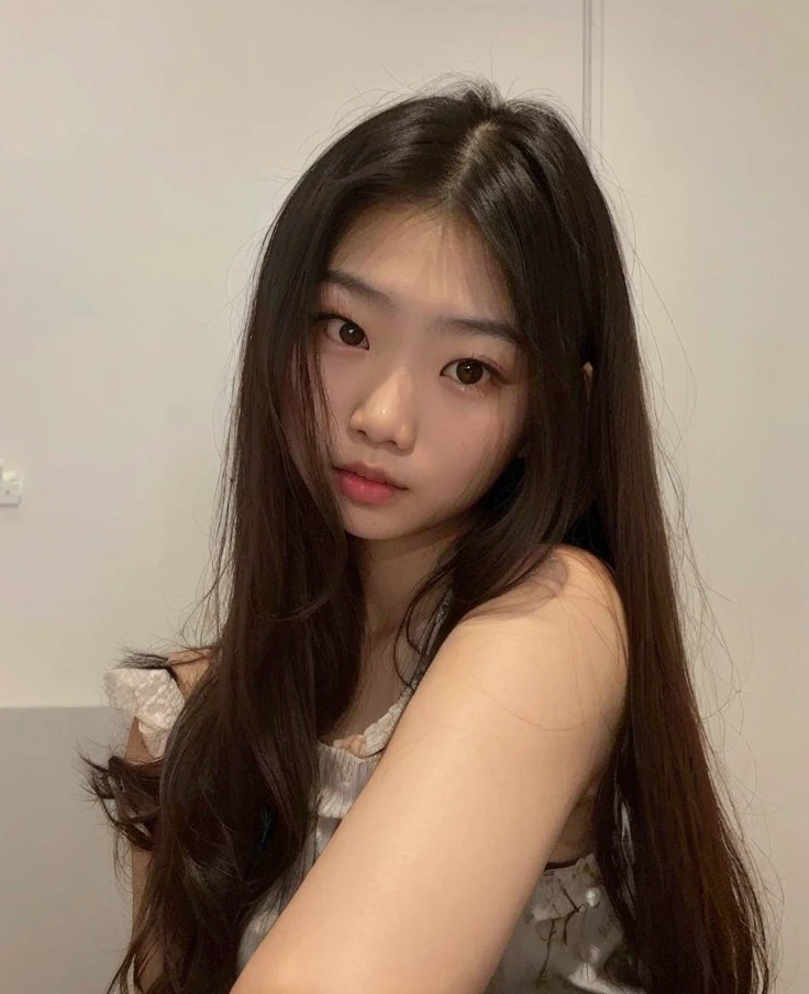 arafed asian woman with long hair posing for a picture, asian girl with long hair, korean girl, beautiful asian girl, asian features, asian girl, young asian girl, with long hair, young cute wan asian face, 18 years old, south east asian with round face, a young asian woman, ulzzang, xision wu, asian face