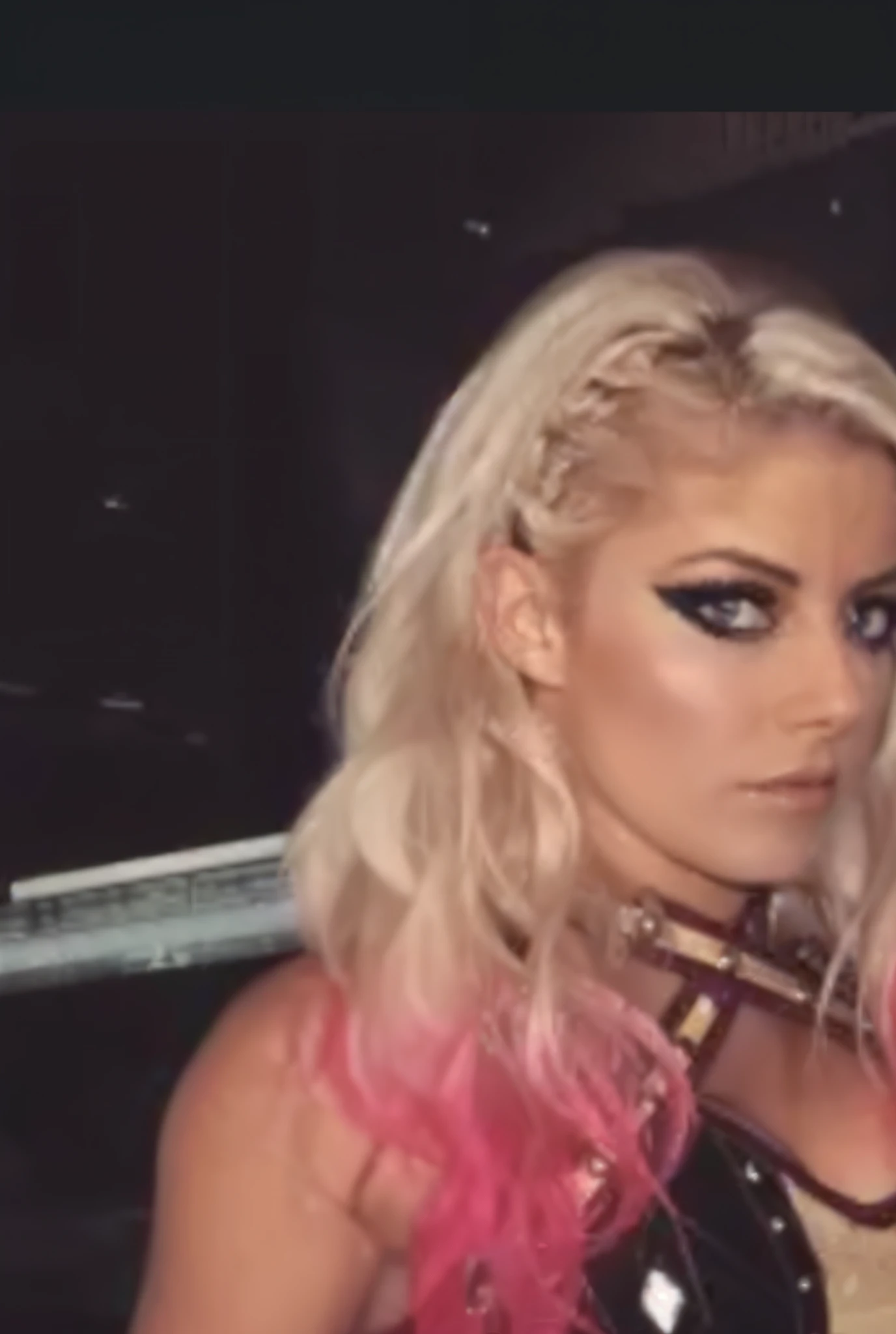 a close up of a woman in a costume holding a knife, wearing shiny breastplate, lady gaga as harley queen, pink body harness, waist - shot, metal bikini, jessica nigri, wearing metal gauntlet, tinyest midriff ever, wwe, metal claws, jessica nigri face!!, badass pose, cl, kaitlyn michelle siragusa