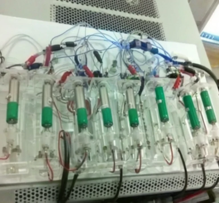 Close-up of a machine with many wires, With tubes and wiring, Circuit bending comprehensive, Full body light-emitting vacuum tube, Tubes integrate with body, full view, screen shot, reactor circuit, Lab Room, circuit, vial, Sensor array, wires and tubes, biohacking, organic transistors, archetype, Wire cybernetics implants