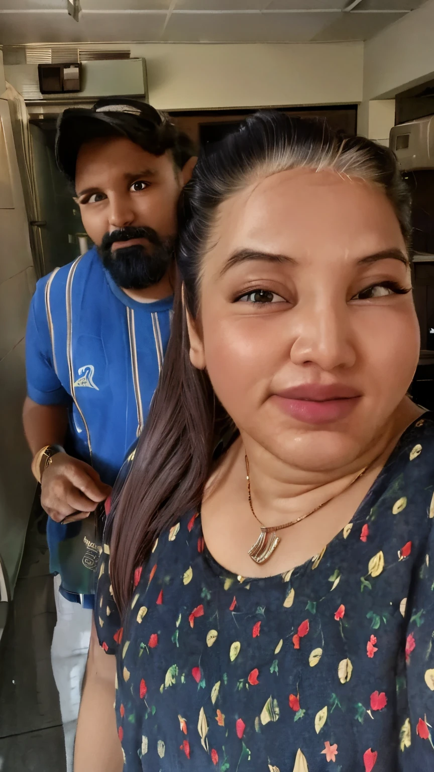 there is a woman standing next to a man in a kitchen, facebook post, with professional makeup, 8k selfie photograph, with accurate face, indian, 30 years old woman, 3 0 years old woman, with round face, traditional makeup, profile image, with lovely look, heavy make up, by Max Dauthendey, taken with sony alpha 9