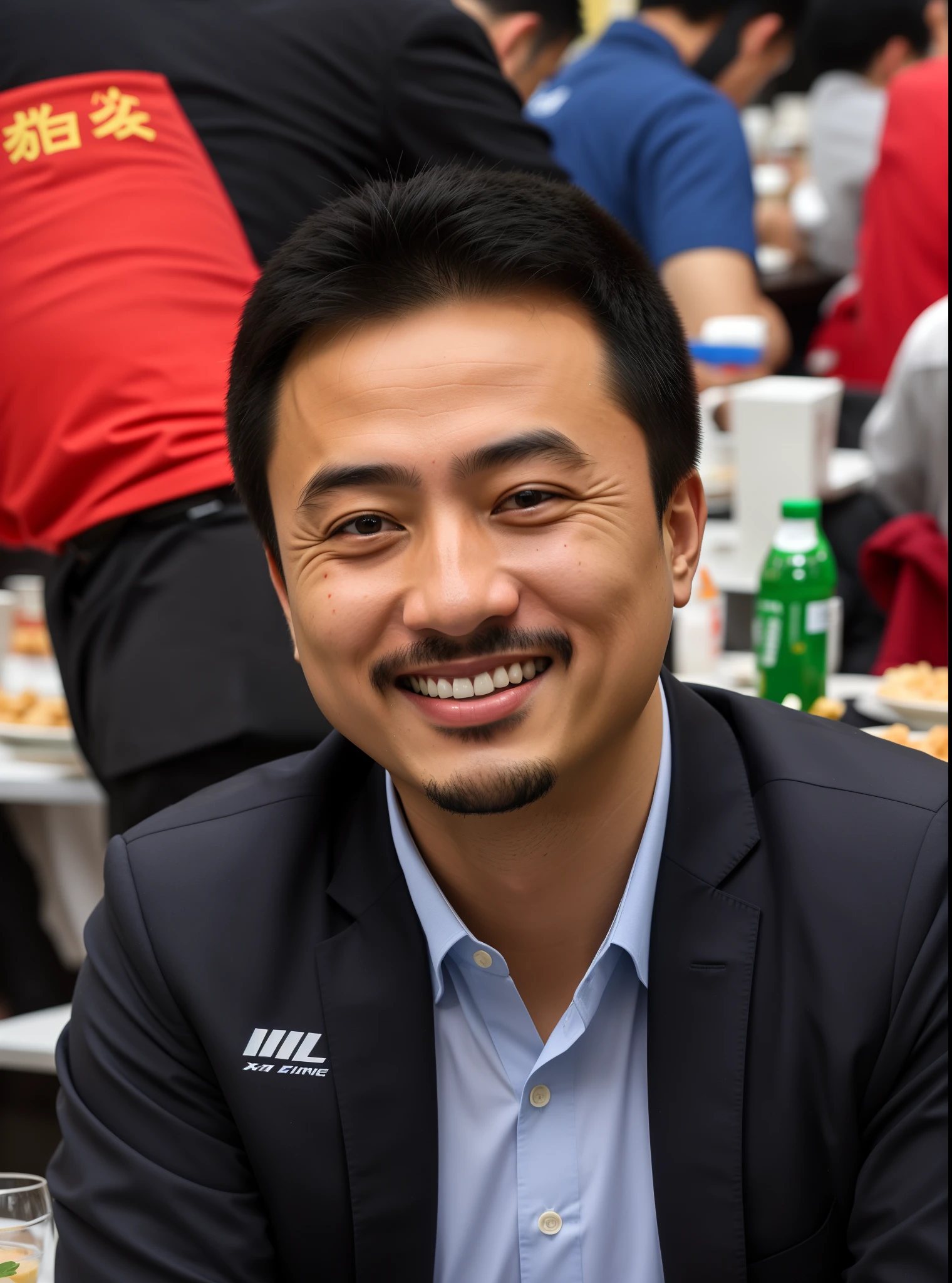 Smiling man sitting at the table with food in front of him, xiaofan zhang, xiaoguang sun, huifeng huang, wang liang, yangjun chen, Nicodemus Jan Mathison, xintong chen, mario feng, eichiro oda, xue han, pengzhen zhang, song nan li, qi sheng luo, Liang Xing
