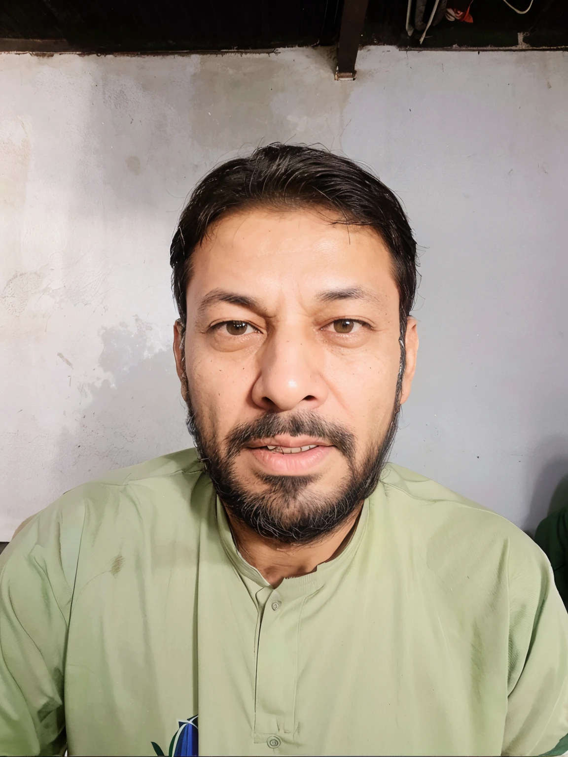 Standing with imran khan in a cricket stadium wearing pakistan cricket shirt named Umar Hayat and shirt No. 54