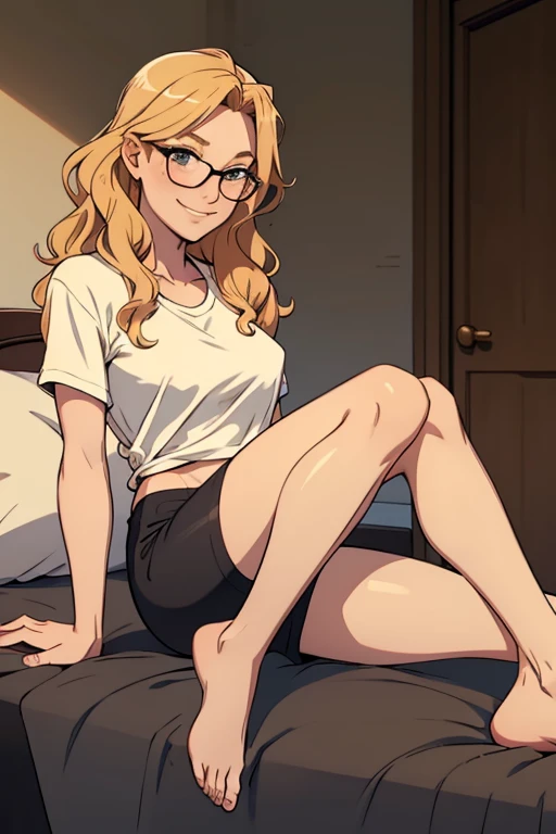 A beautiful barefoot woman with short wavy strawberry-blonde hair, wearing black sports shorts and glasses, sitting on a bed, looking happy.