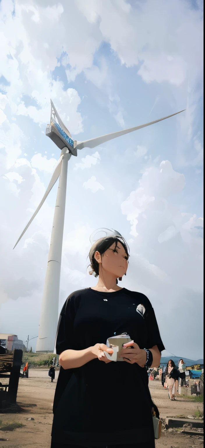Blue sky and white clouds Huge windmill Beautiful woman in black T-shirt