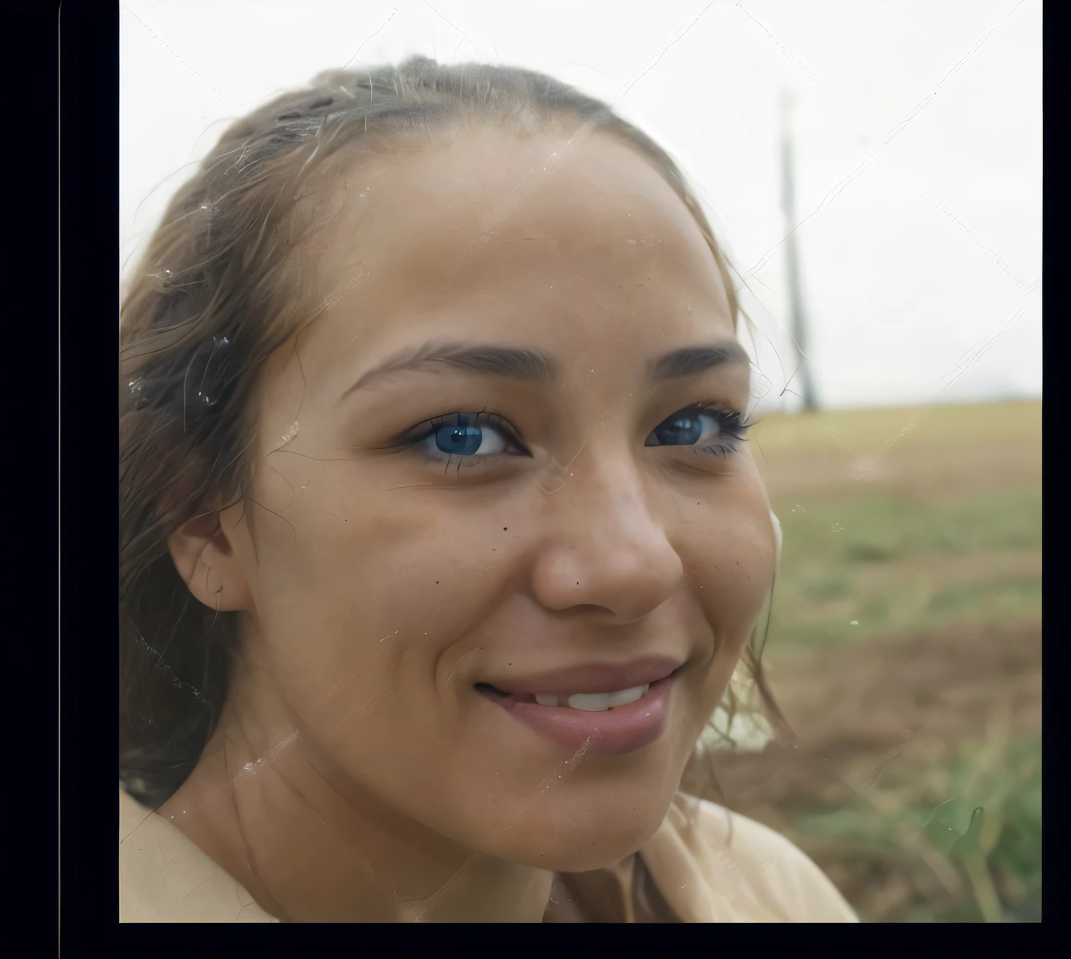 smiling woman with a cell phone in her hand and a field in the background, mixed race woman, mixed-race woman, closeup headshot portrait, center frame portrait, high angle closeup portrait, taken in the late 2000s, close up portrait of woman, photo of a woman, taken in the 2000s, detailed face of a woman make her eyes blue