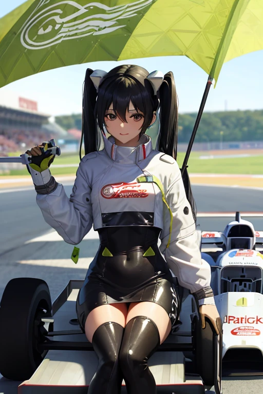 A black haired woman F-1 racer with brown eyes is sitting on her F-1 car.