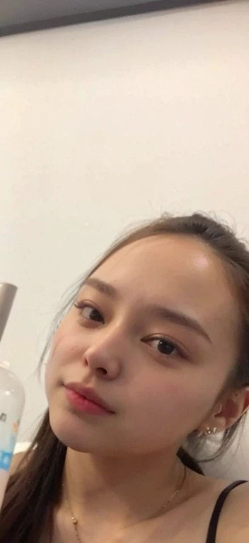 there is a woman holding a bottle of lotion and a toothbrush, 18 years old, selfie of a young woman, iphone selfie, 21 years old, 2 , 30 years old woman, selfie photo, 3 0 years old woman, 1 8 yo, 2 3 years old old, wide foreut makeup, sexy face